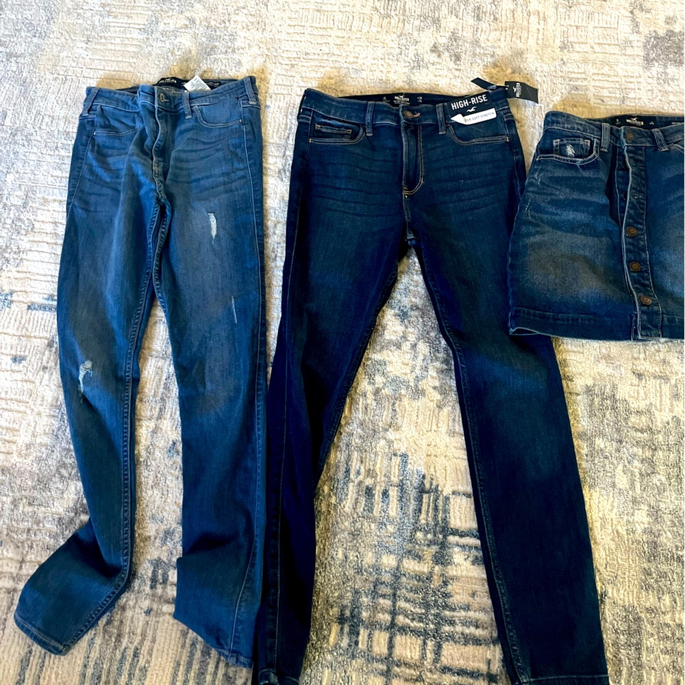Women's Hollister bundle two pairs of jeans and a denim skirt.